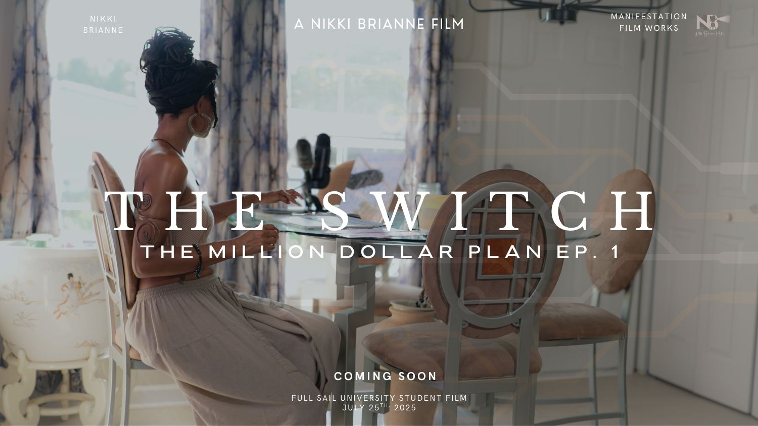 A clean, minimalist wide shot of Fiyah seated at a glass table, wearing taupe, facing a sunlit window as she prepares for the hard work ahead.